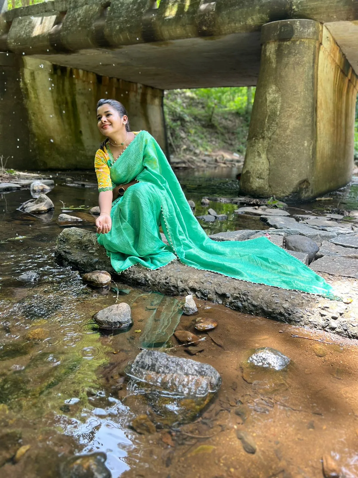 Green tissue saree with yellow floral hand worked blouse